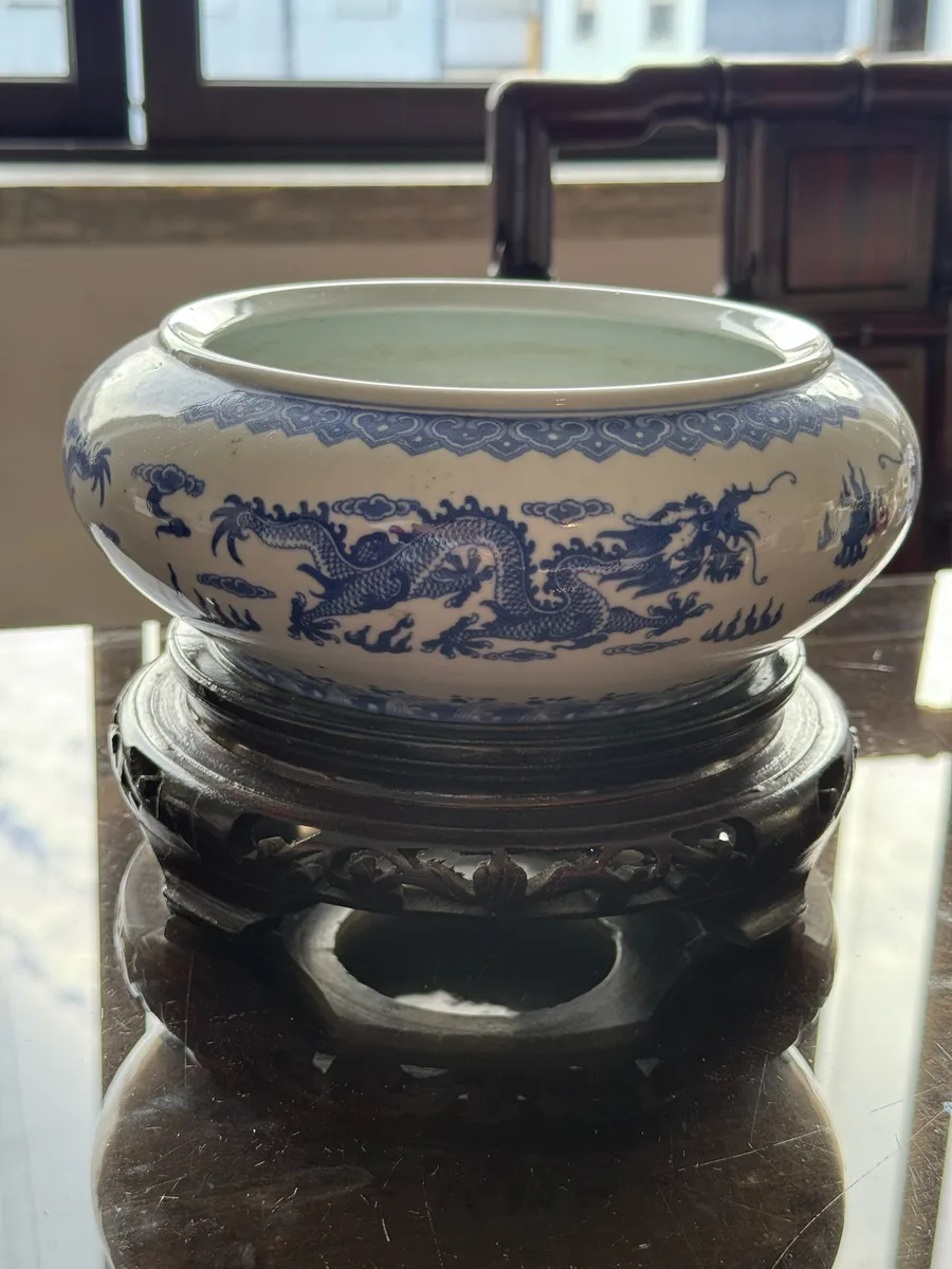 Blue and White Dragon Motif Porcelain Bowl with Wooden Base